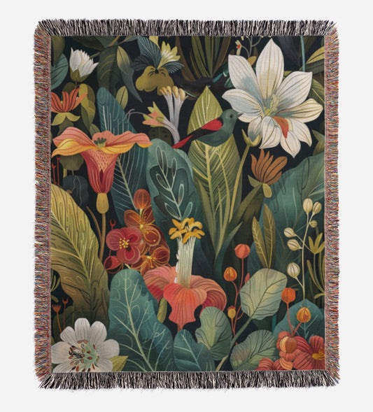 a blanket with flowers and leaves on it