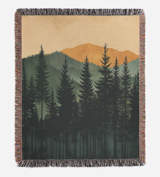 a tapestry of a forest with mountains in the background